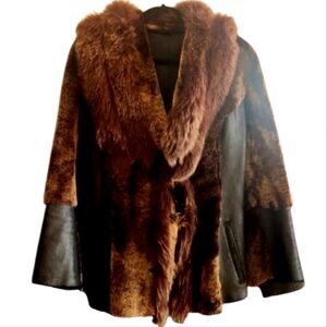Jacket faux fur fur combo with leather like patching throughout